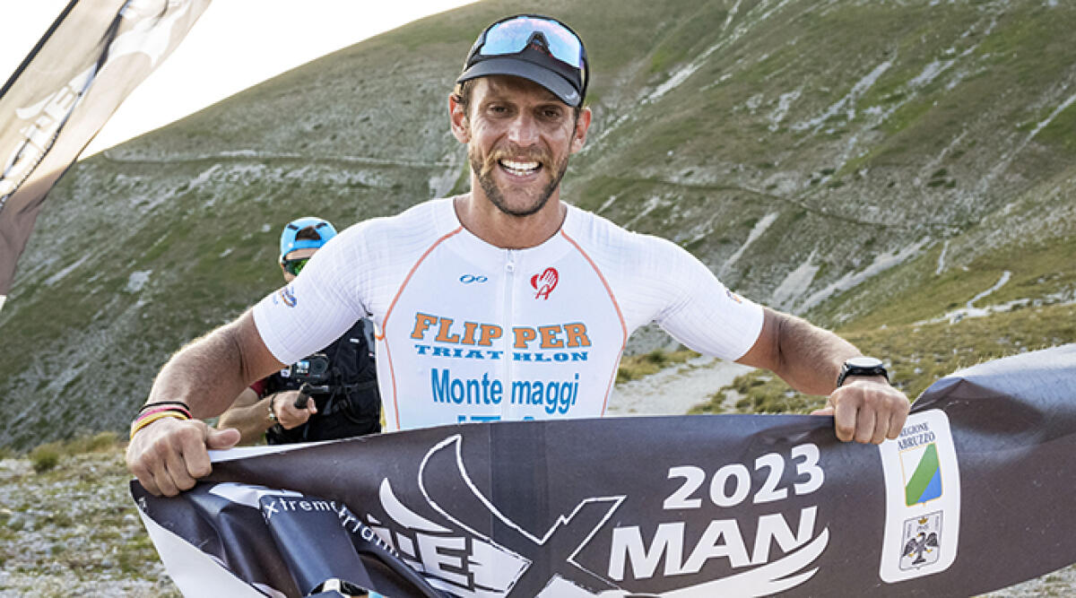 Nicholas Montemaggi conquista il secondo posto al triathlon estremo eagleXman - Nicholas Montemaggi mentre taglia il traguardo della EagleXman 2023