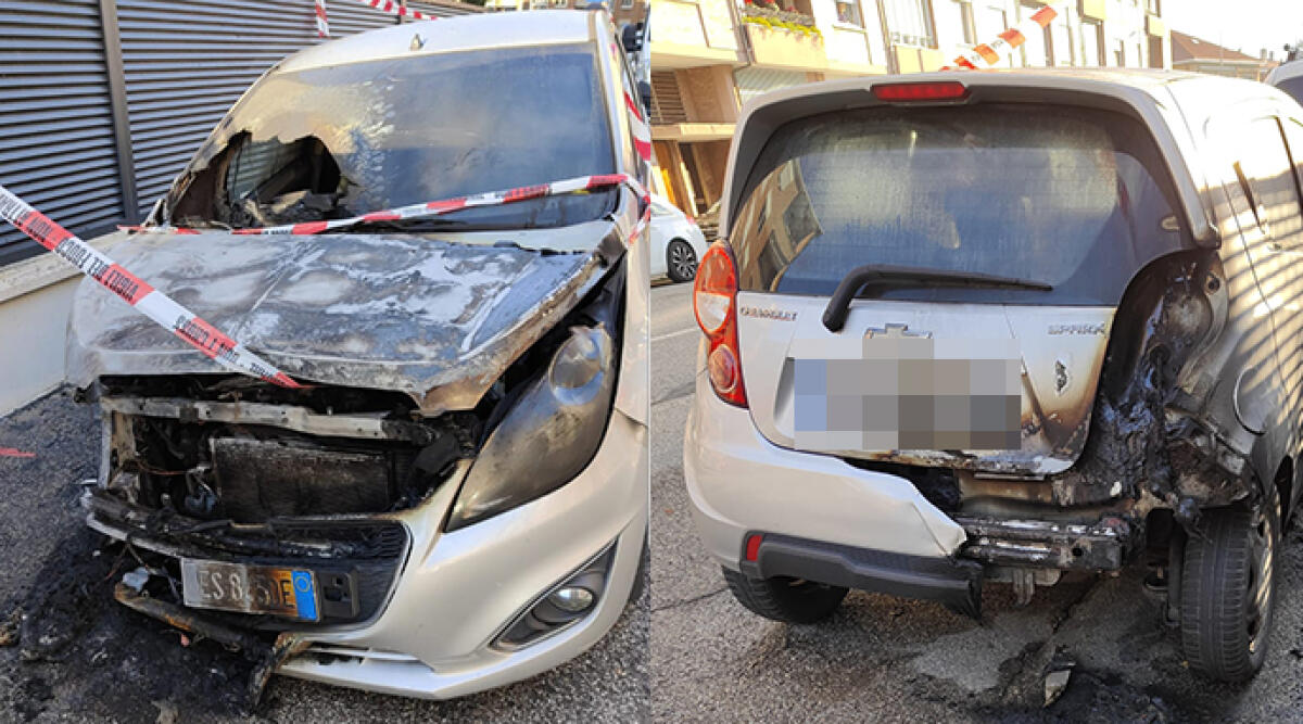 Incendio doloso distrugge un'auto a Rimini: indagini in corso - L'auto distrutta dalle fiamme