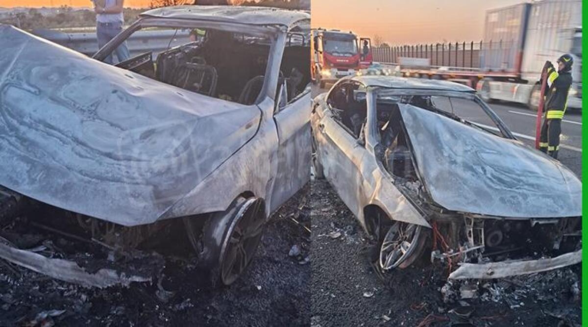 Auto in fiamme sull’A14, paura tra Rimini Nord e Sud - L'auto distrutta dalle fiamme