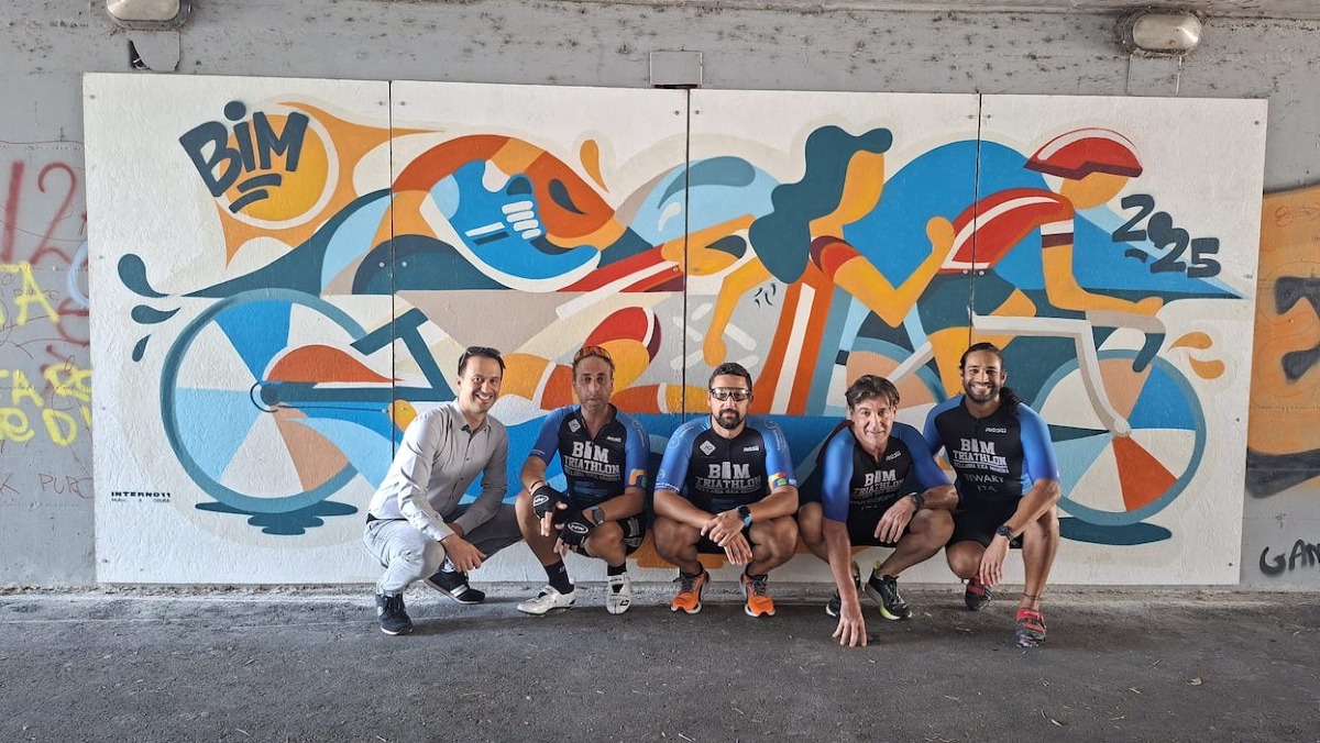 Il murales del Bim Triathlon collocato in via Cornelio Nepote -